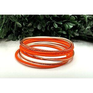 Set Of 8 Orange and Gold Tone Bangles With Shimmer Accents